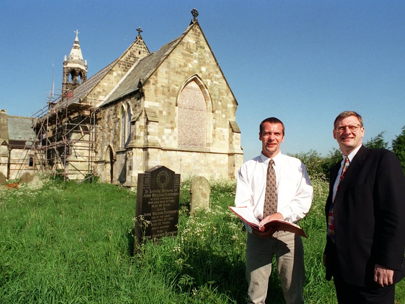  The new entrance provided  for the Barn Owls   that are  residing in the  13th century Ellerton Priory Church at the village of Ellerton in May 1998.  Pictured is Gavan Rostron , left., community projects officer for Enventure Northern Ltd looking at some plans with  Tim Holman a trustee  of Ellerton Church  Preservation Trust.