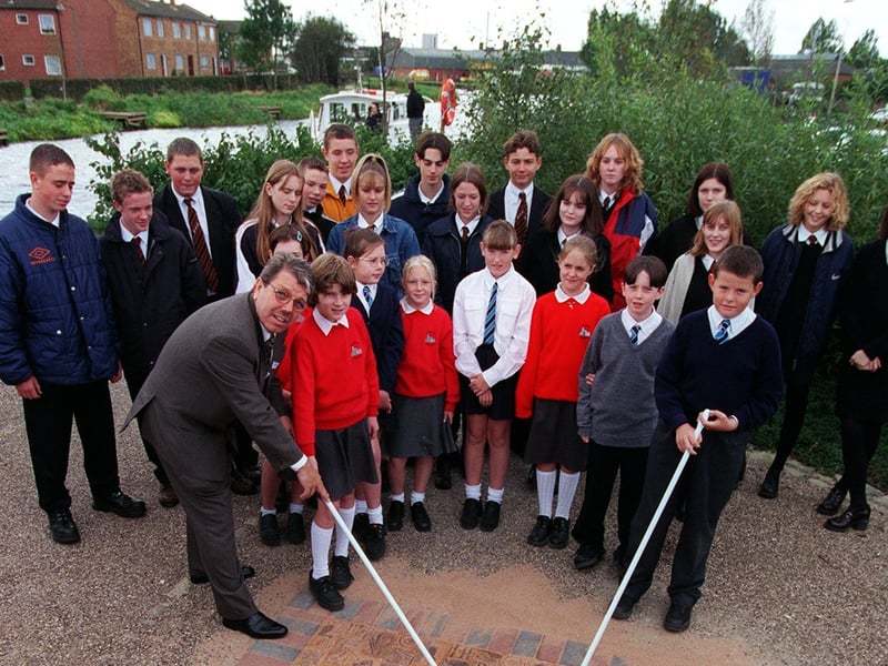 Environment Minister Alan Meale unveils a mosaic by Selby schoolchildren in September 1998. He is pictured sweeping away sand with Morag Reid, from Wistow School, and Daniel Sykes, from Cawood Primary School, during his visit to the Selby Waterfront which has been regenerated by the Selby Waterfront Partnership. 