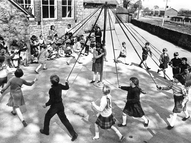 Maypole dancing at Trefonen CofE School in the playground in 1968.