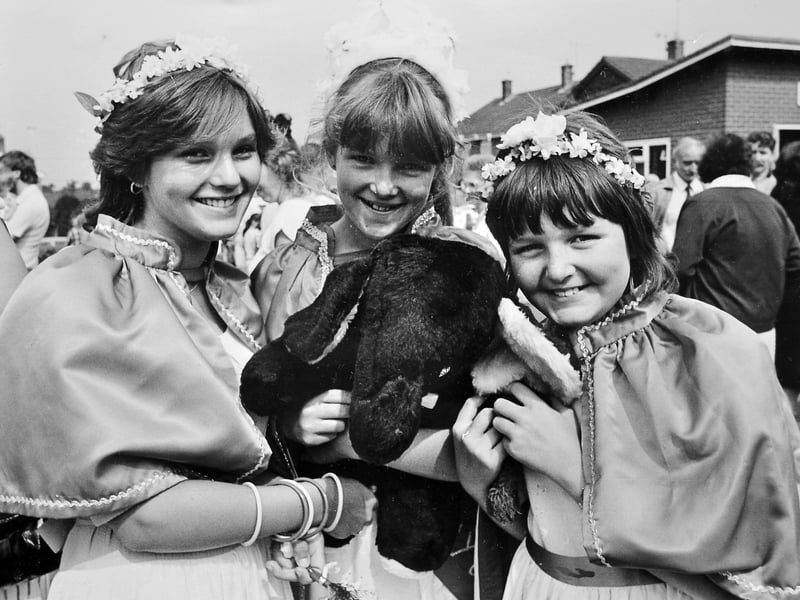 Church Aston May Queen Vicky Paterson (12) with her attendants Helen Bainbridge (13) and Caroline Dodd (10), pictured with a cuddly toy at the show.