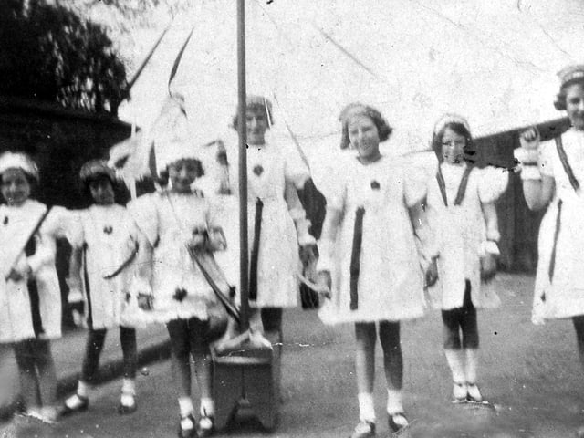 Maypole dancers in Meadow Terrace, Crewe Street, Shrewsbury, 1 May 1936. This picture was shared by Mrs Ida Gurr, who recalls: “Happy days. From left: Barbara Monslow, Joy Davies, Audrey Powell (queen), Audrey Davies, Vera France, Joan France, and Ida Powell, who later became Mrs Ida Gurr.”
