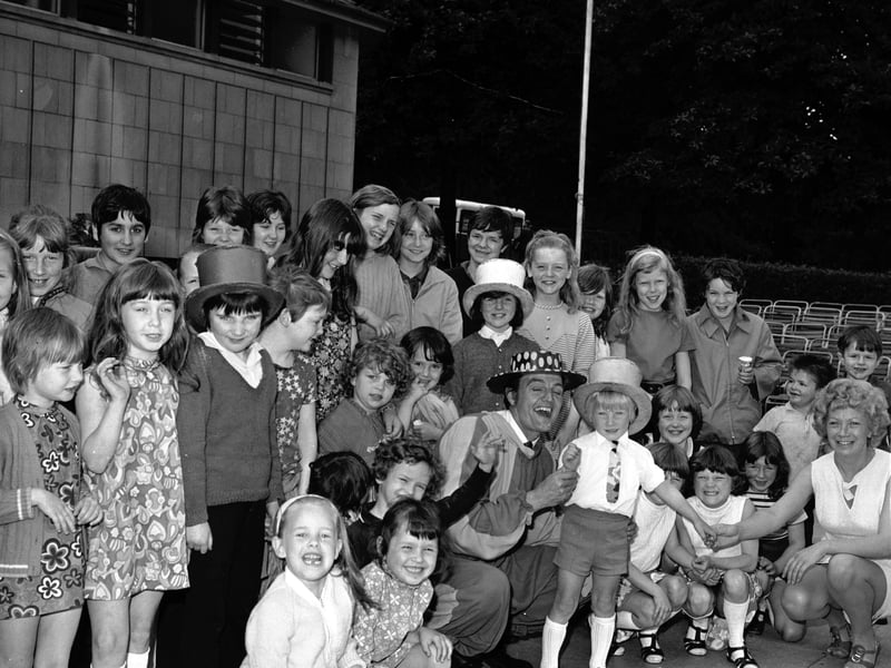 Children's entertainer John Bell with some of the audience at the Ross Bandstand in Princes Street Gardens, Edinburgh, in July 1971