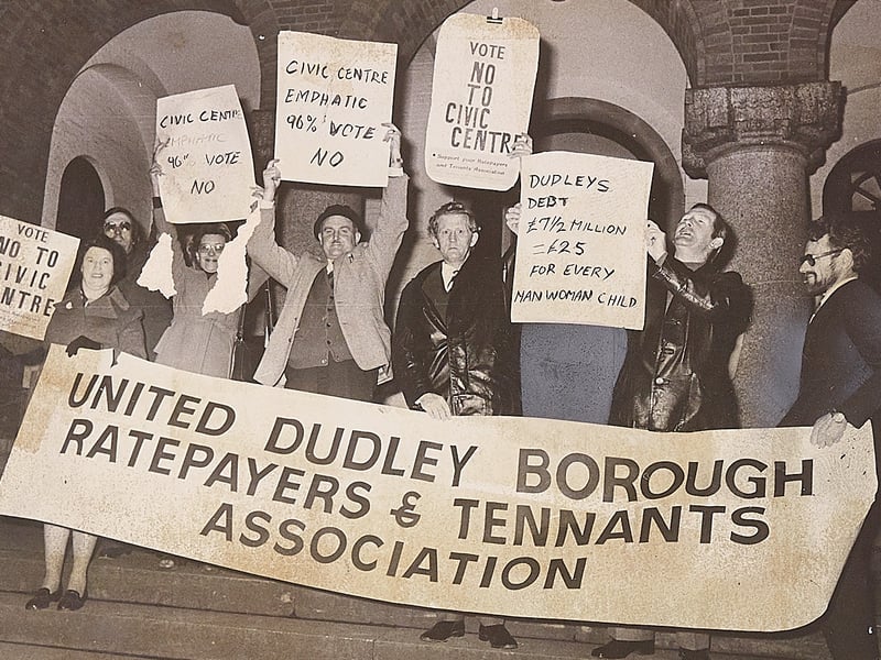 November 1975: Members of the United Dudley Borough Ratepayers’ and Tenants’ Association gather with banners and placards after collecting 7,000 signatures across Dudley, Stourbridge and Halesowen, protesting against plans for a new civic offices complex in a show of strong local feeling.