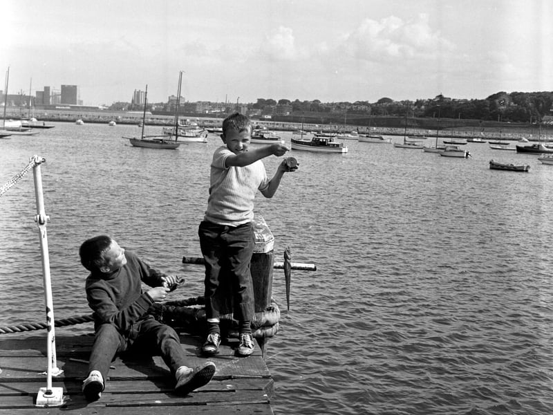 Two boys fishing at Granton harbour, Edinburgh, in July 1972
