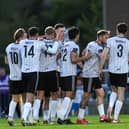 Killian Brouder of Galway United (centre) is congratulated by teammates after scoring his side's  goal in RSC last Friday. 