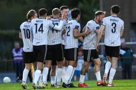 Killian Brouder of Galway United (centre) is congratulated by teammates after scoring his side's  goal in RSC last Friday. 