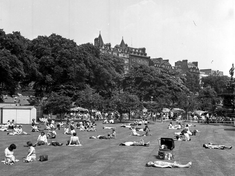 Sunbathers enjoy the summer sunshine in Princes Street Gardens, Edinburgh, in July 1971