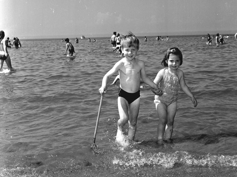 A boy and a girl play in the sea at Gullane, East Lothian, in July 1972