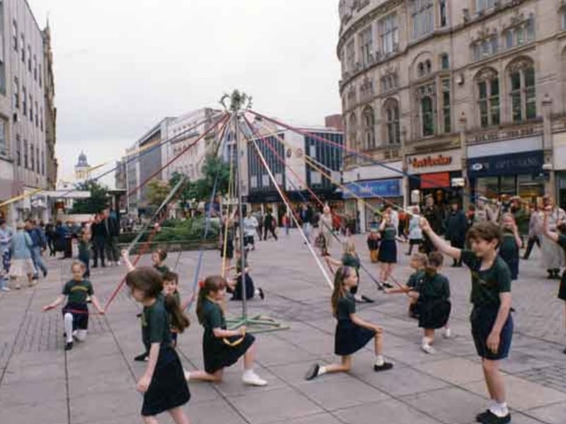 Maypole dancing on Fargate, Sheffield city centre, in May 1993