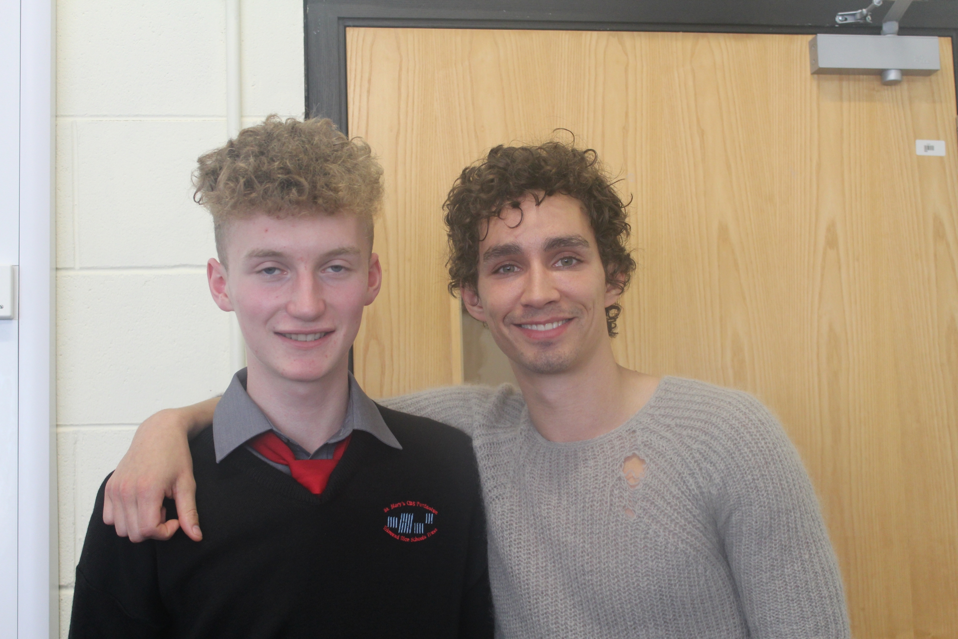 Below: Script writer Thomás Dunne with Robert Sheehan at Portlaoise CBS.