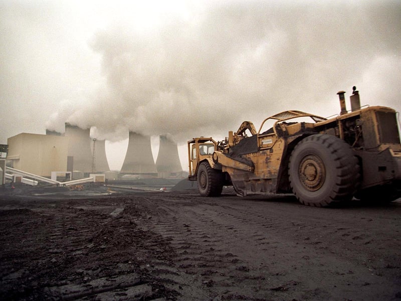 An earth mover makes its way down the one and a half million tonne stock pile of coal from the Stillingfleet Mine, at the Drax Power Station in November 1997.
