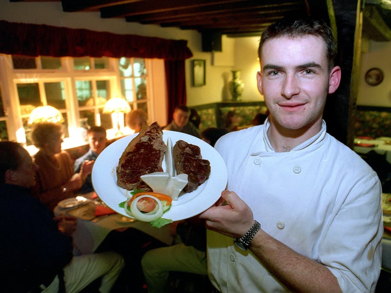 Tim Summerton , chef at the Rythre Arms at Ryther in January 1998 with with a t-bone steak meal.