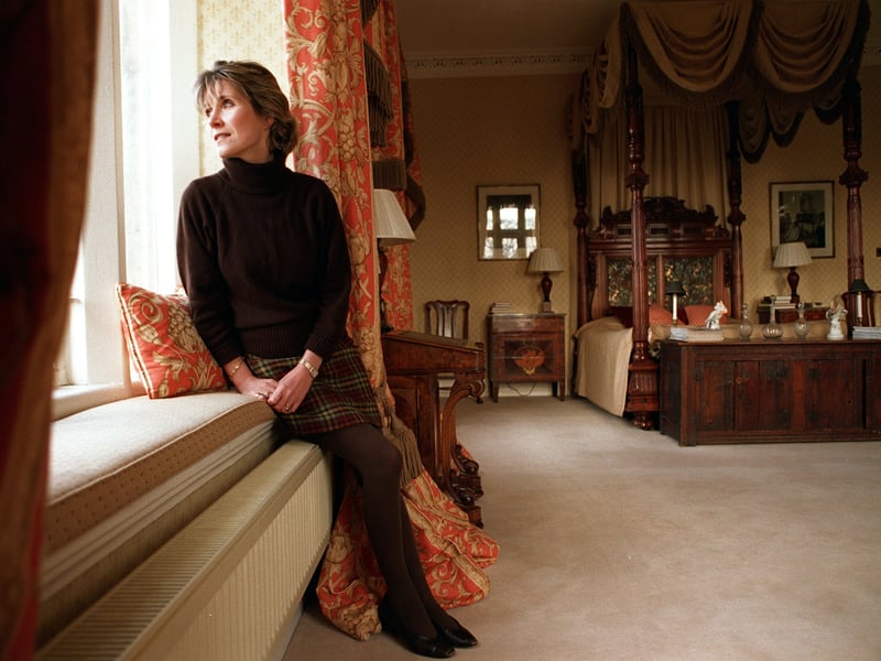 January 1998 and Lady Gerald Fitzalan Howard is pictued in one of  the newly decorated bedrooms  at her home, Carlton Towers.
