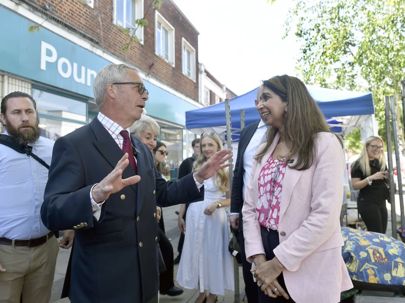 Reform UK's local election campaign - Nigel Farage and Suella Braverman were campaigning in Waterlooville Precinct on Friday, May 1, 2026. 

Pictured is: Suella Braverman with Nigel Farage 

Picture: Sarah Standing (010526-816)