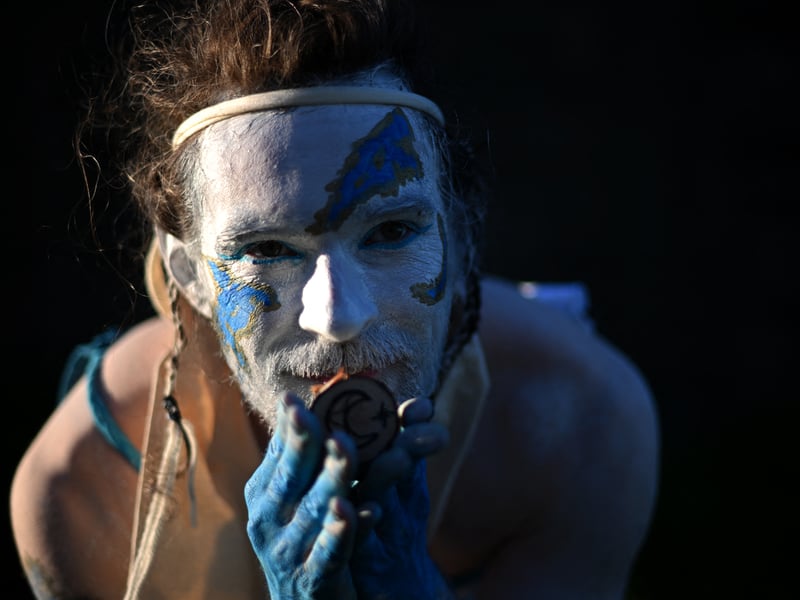 Performers help tell the story of the seasons changing.