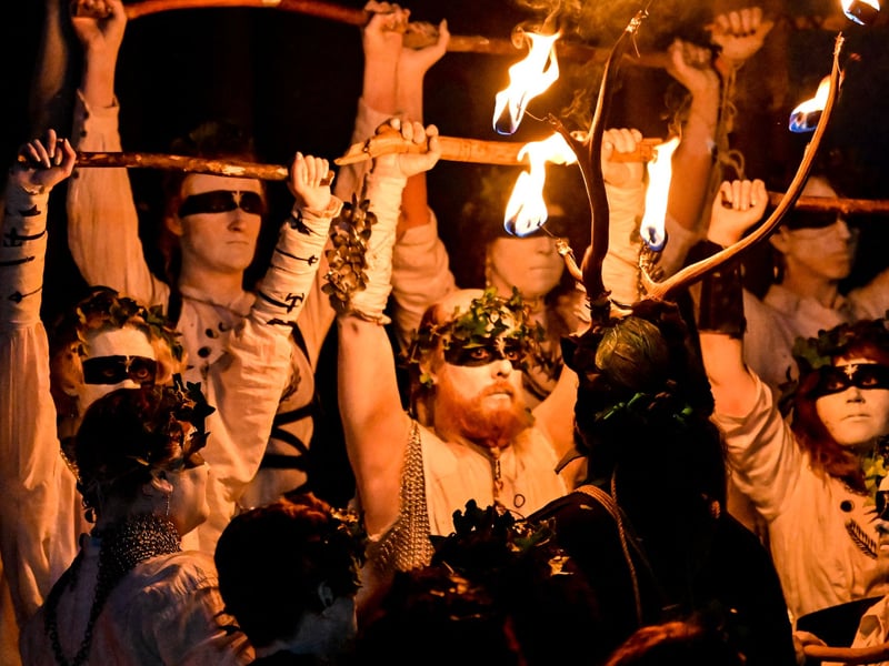 Various groups of performers help the procession along.