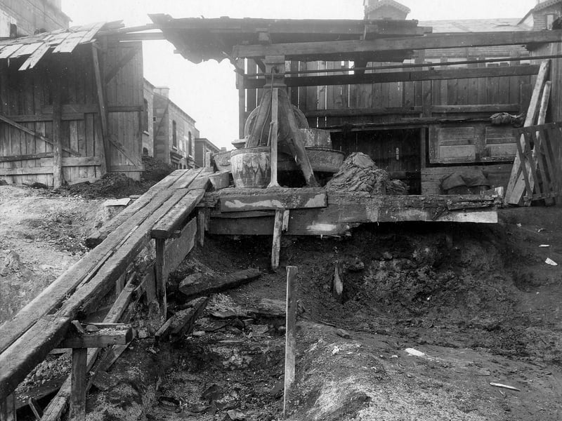 The demolition site of Burley Working Men's Club on Cross Cardigan Mount in November 1907.