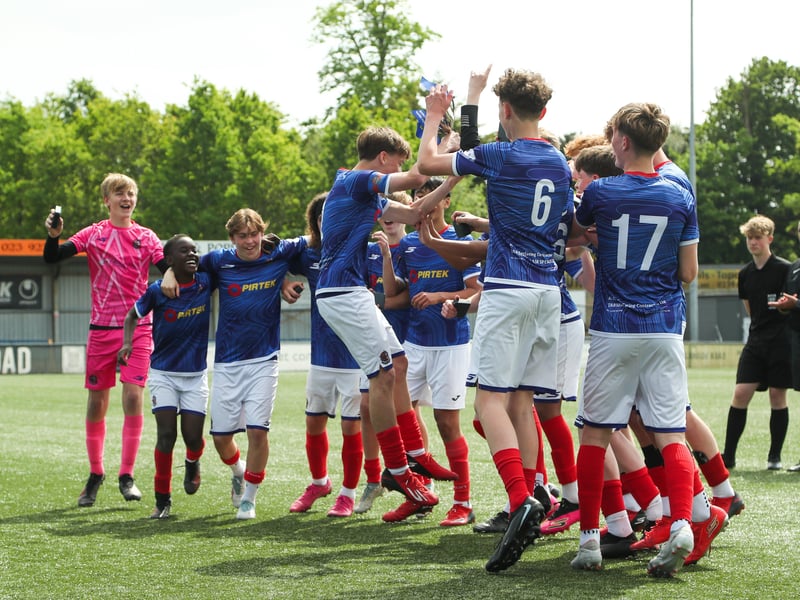 The Titchfield Youth players celebrate their win against Portsville Park Rockets in the under-14 Memorial Challenge Cup Final at Westleigh Park