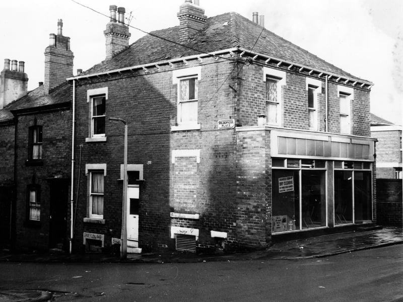 On the left of the image is a row of through terraced houses, numbers 4 to 8 Holderness Place. On the right at number 35 King's Road is a Monarch Co-op, dry cleaning store. Pictured in December 1972.