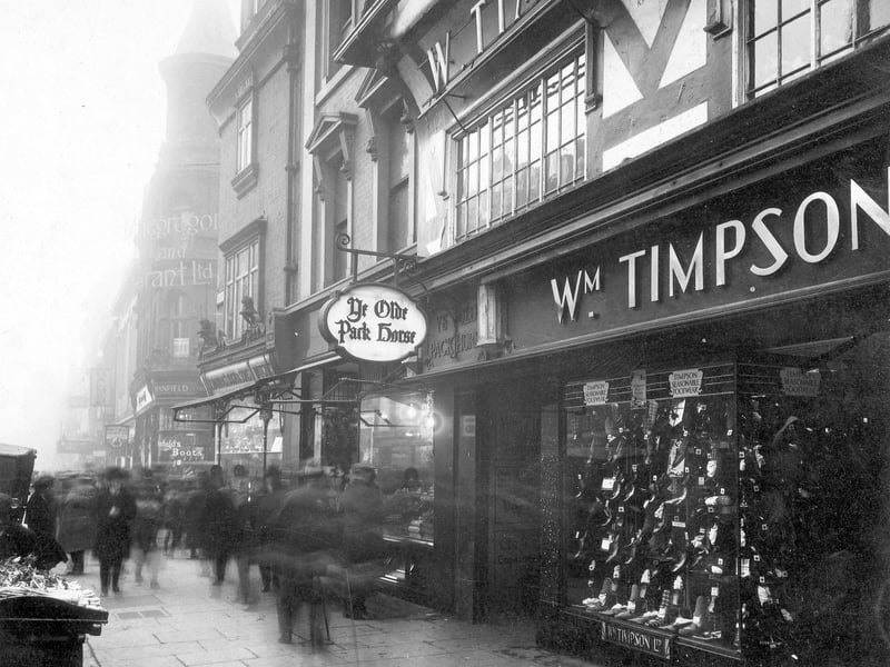 Briggate looking towards Commercial Street in December 1930. From right to left can be seen Timpson's shoe shop, Ye Olde Pack Horse, Barraclough and Sons Lts, jewellers, Commercial Street, Manfield shoe shop, Whitelocks.