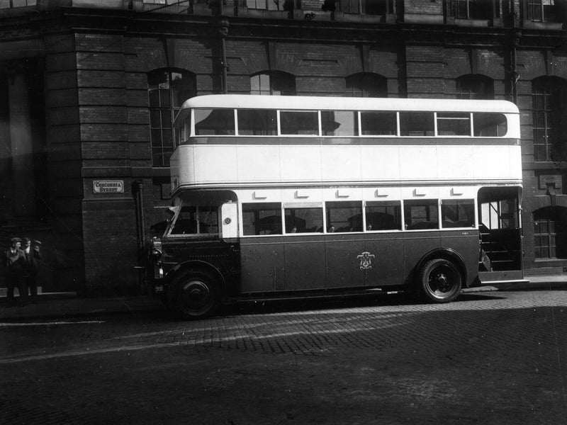 A Crossley 64 double decker bus parked outside the Leeds City Transport Offices on Concordia Street.