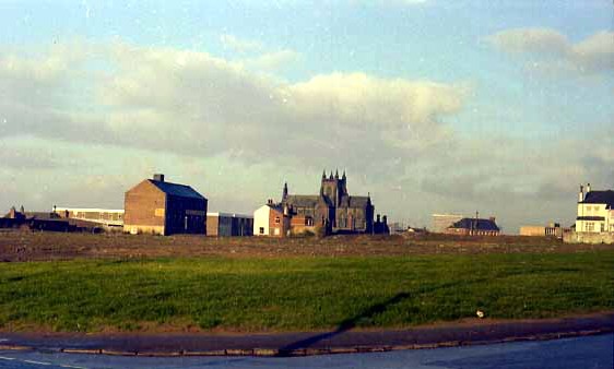 St Saviour's Church is visible in the centre of this view, which looks from the junction of Easy Road and Dial Street. On the far right, the cream coloured building is the Yew Tree Inn, while the white coloured gable end to the left of centre is another pub, the Spring Close.