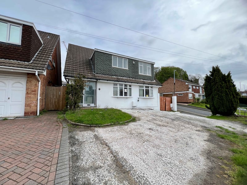 With a broad driveway and gardens to the side and rear, the property extends over three floors. The ground floor has a porch, a hall with a store, a through reception room, snug and shower room with toilet. The first floor has five bedrooms and bathroom, while the attic room has been converted to a playroom, and gas central heating and double glazing are fitted.