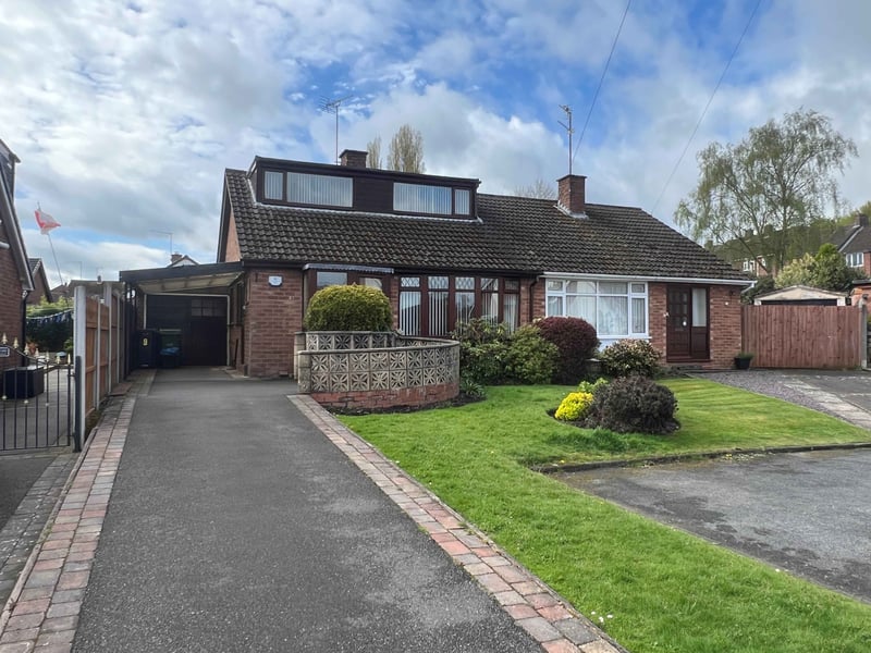 This is a semi-detached dormer bungalow in Kingswinford, with a £75,000+ guide price. There are two reception rooms, a kitchen, inner hall, store, bedroom and shower room with toilet downstairs, and two more bedrooms upstairs. Gas central heating and double glazing are fitted, and outside is a driveway and car port, plus gardens front and back.
