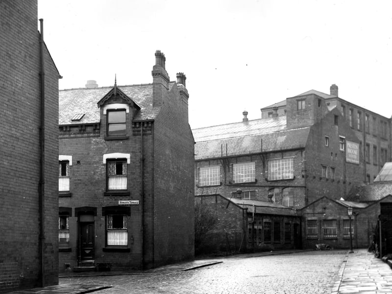 Howarth Street showing the junction with Howarth Terrace on the left in December 1965. To the right of the picture is Elmwood Mills, occupied by Preston Brooke & Co. Ltd., wholesale clothiers, which faces onto Elmwood Lane.