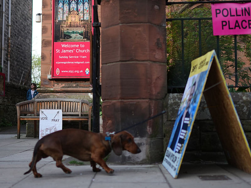 A dachshund outside Saint James' Church polling station in Edinburgh.