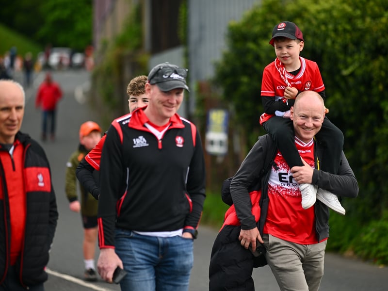 Derry supporters arrive ahead of the Ulster GAA Football Senior Championship semi-final match.
