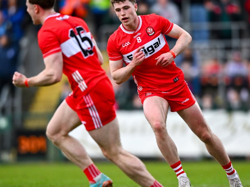 Derry players Lachlan Murray, left, and Eoin McEvoy celebrate their side's second goal. (Photos: Shauna Clinton/Sportsfile)