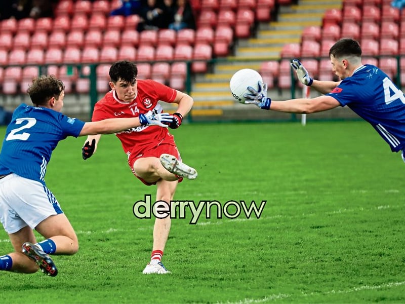 Derry’s captain Don Mulholland kicks the ball towards the target.