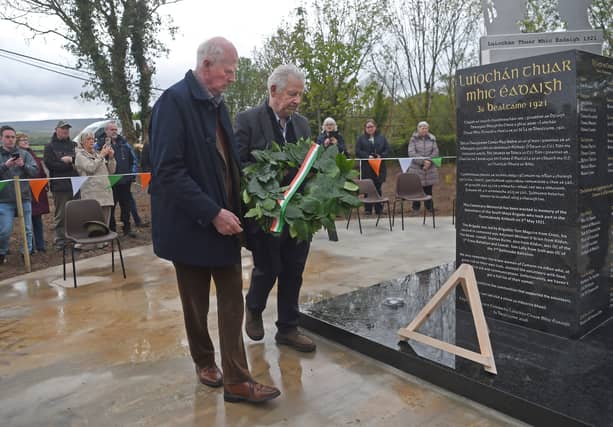Tom Maguire and Pake Conroy laying a wreath at the 1921 Tourmakeady Ambush monument which was unveiled at a ceremony on Sunday last in Tourmakeady. Pic: Conor McKeown