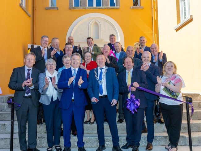Cathaoirleach of Laois County Council, Cllr Barry Walsh cuts the tape at the official opening of the redeveloped former Portlaoise Convent site.