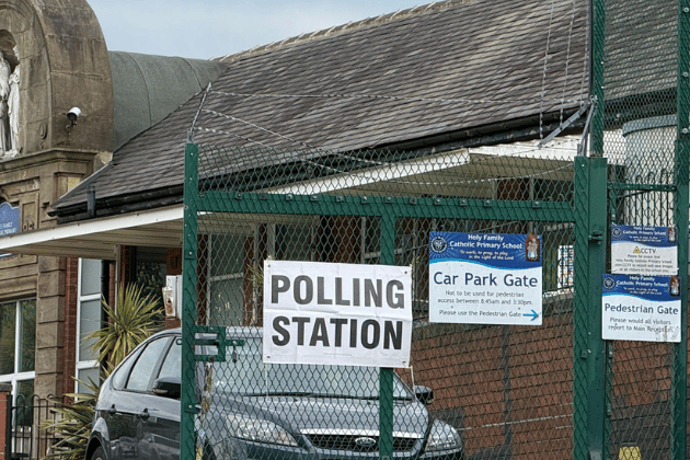 One of the polling stations in Armley, with the station itself inside a prefab on the grounds of Holy Family Catholic School.
