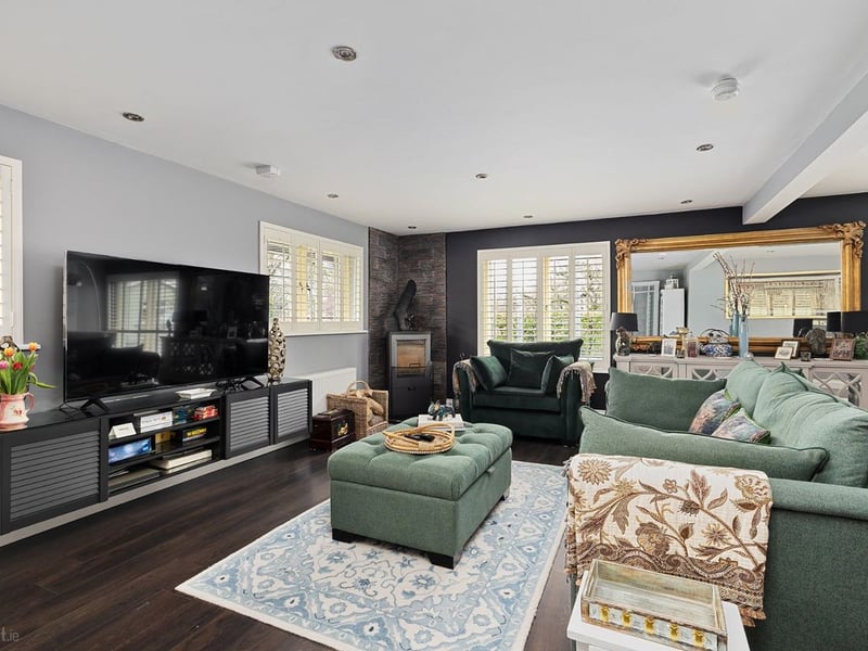 Amberley, Newtown, Celbridge has come on the market with a price tag of €1,275,000. This exquisite five bedroom detached family home is set on 1.81 acres of rolling Kildare countryside. This stunning and energy efficient smart home is superbly located on Liffey View Road, Newtown, Celbridge in one of the most sought after residential locations in Kildare. Set back from the road in a peaceful and immaculately manicured country setting, Amberley is accessed through electronic gates and a sweeping driveway provides both seclusion and privacy. This exceptionally spacious and elegant family home extends to 3,250 sq. ft of expansive and light filled accommodation and has been remodeled and upgraded several times to an exceptional build specification and finish. READ MORE: Great news as plans for new Lidl in Kildare The expansive open plan kitchen with its split-level bespoke feature island, spacious dining area and sitting area is the focal point of this stunning home. The bespoke hand crafted kitchen with floor to ceiling cabinetry and high-end appliances is filled with an abundance of natural light and 2 sets of “lift to slide” doors open out to a delightful, enclosed patio area. The spacious utility and boot room is both exquisitely designed and exceptionally functional. The ground floor also features two impressive reception rooms, one of which is currently used as a master bedroom suite with walk-in wardrobe and an en-suite. Accommodation on the first floor includes 5 perfectly proportioned and beautifully styled bedrooms, four of which are en-suite. Amberley is minutes away from the bustling town of Celbridge with its wealth of amenities and services. The charming village of Ardclough and the country retreat of Lyons Estate are also on it’s door step. This truly magnificent residence offers the discerning buyer a country, tranquil lifestyle with immediate access to a bustling town on one side and a quaint village on the other and its strategic proximity to the M4 and M7 means you will be in