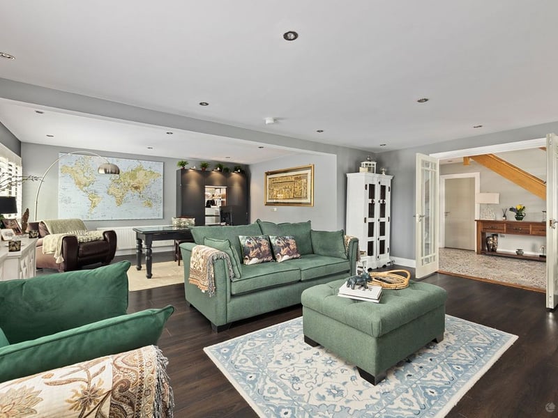 Amberley, Newtown, Celbridge has come on the market with a price tag of €1,275,000. This exquisite five bedroom detached family home is set on 1.81 acres of rolling Kildare countryside. This stunning and energy efficient smart home is superbly located on Liffey View Road, Newtown, Celbridge in one of the most sought after residential locations in Kildare. Set back from the road in a peaceful and immaculately manicured country setting, Amberley is accessed through electronic gates and a sweeping driveway provides both seclusion and privacy. This exceptionally spacious and elegant family home extends to 3,250 sq. ft of expansive and light filled accommodation and has been remodeled and upgraded several times to an exceptional build specification and finish. READ MORE: Great news as plans for new Lidl in Kildare The expansive open plan kitchen with its split-level bespoke feature island, spacious dining area and sitting area is the focal point of this stunning home. The bespoke hand crafted kitchen with floor to ceiling cabinetry and high-end appliances is filled with an abundance of natural light and 2 sets of “lift to slide” doors open out to a delightful, enclosed patio area. The spacious utility and boot room is both exquisitely designed and exceptionally functional. The ground floor also features two impressive reception rooms, one of which is currently used as a master bedroom suite with walk-in wardrobe and an en-suite. Accommodation on the first floor includes 5 perfectly proportioned and beautifully styled bedrooms, four of which are en-suite. Amberley is minutes away from the bustling town of Celbridge with its wealth of amenities and services. The charming village of Ardclough and the country retreat of Lyons Estate are also on it’s door step. This truly magnificent residence offers the discerning buyer a country, tranquil lifestyle with immediate access to a bustling town on one side and a quaint village on the other and its strategic proximity to the M4 and M7 means you will be in