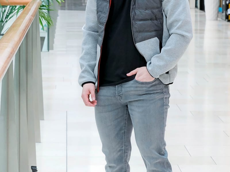 Toby hybrid jacket (light grey melange), €59.99; Bono tee (black), €14.99; Tim original jeans (grey denim), €49.99