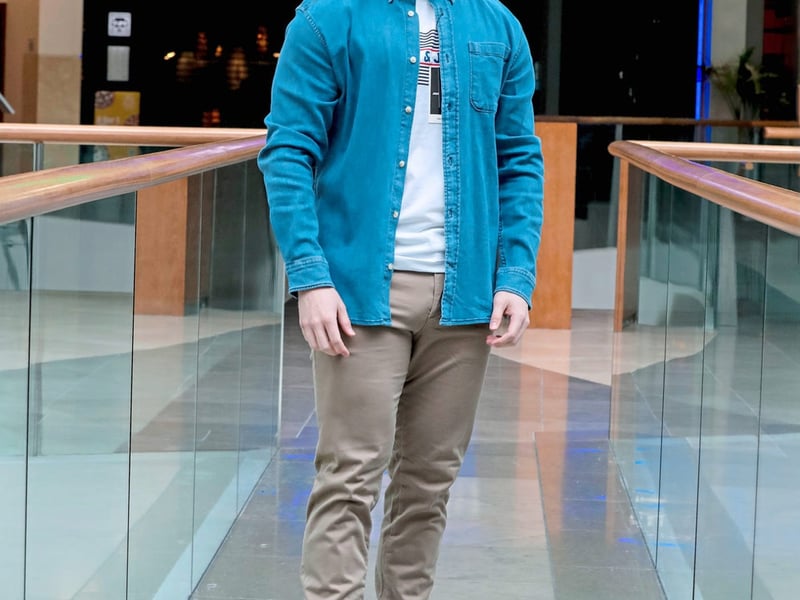Perfect denim shirt, €39; Corp logo tee, €12.99; Marco Bowie beige trousers, €39.99