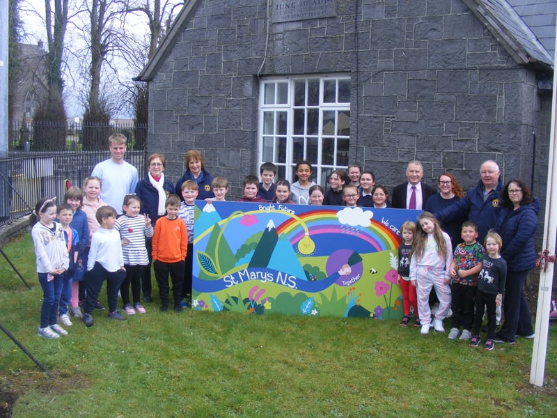 ST Mary's National School - All twenty four students at St. Mary's N.S. took part in this project. We brainstormed different ideas and with Ms. Duggan’s help, designed this colourful mural. We wanted it to be bright and cheerful and there are different messages portrayed within the piece. We all loved taking part in it. It took lots of time and effort but we really enjoyed working together as a whole school on this project. We can't wait to see it in its place with all the other murals.
