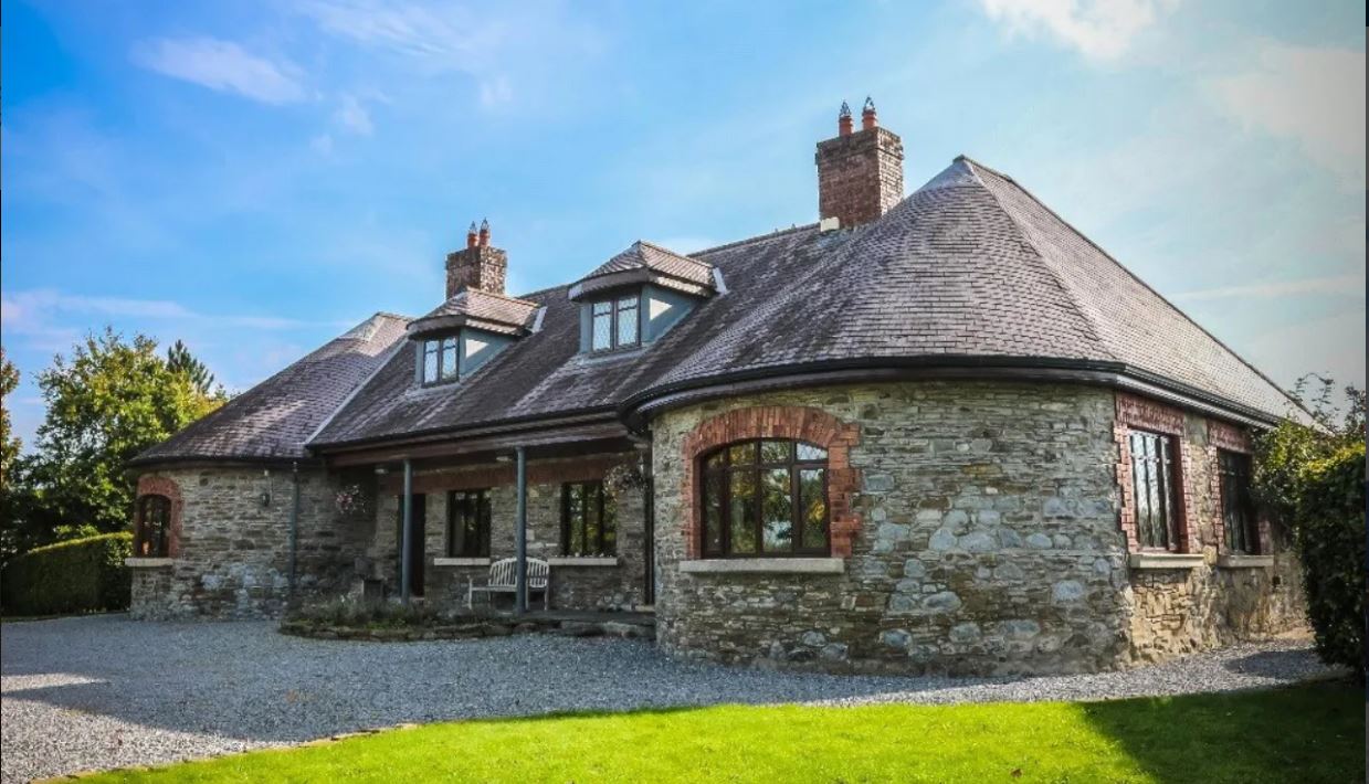 - FOR SALE - The Old School House, Jenkinstown Park, Kilkenny, R95 E5V6, The Old School House was built in the 1830s by Elizabeth Bryan from nearby Jenkinstown House Estate, as a school house for the children of the tenants on the estate. Elizabeth Bryan modelled the design on french schools she saw while she was in school in France. The building was only in use as a school for approx. 4 years.  The house was fully renovated in the 1990s to a very high specification with the addition of the first floor. Two dormer windows were added to the front and several Velux windows were added to the sides and rear of the property. The slates on the roof are 'Blue Bangor' slate. Two striking Conservatories were also added to the rear overlooking the gardens and paddocks. The property was further developed by the current owners in 2001 to its current impressive standard and has a building energy rating of C2. The Old School House is a truly tranquil residence with a unique countryside setting with river frontage. The property sits on circa 2 Acres / 0.8 Hectares of mature gardens which is ideal for country living and entertaining. The meticulous attention to detail and the high quality finish is very evident through this outstanding home. The light filled and spacious accommodation extends to approximately 376 Sq. M. / 4,047 Sq. Ft. over two floors. The layout at ground floor level comprises: an impressive entrance hall, three reception rooms, a magnificent open plan kitchen/dining/family room, laundry room, storage room, bedroom four and a family bathroom. The layout at first floor level comprises: a large landing area, three double bedrooms, (master with an en-suite and a dressing room) and another family bathroom. ASKING PRICE: €775,000 CLICK 'NEXT STORY>' ABOVE FOR PICS