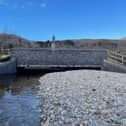 River being taken over by stones washed down in floods at Kylemore Bridge leaving little room for water to flow. Hence continuous flooding out onto the road.