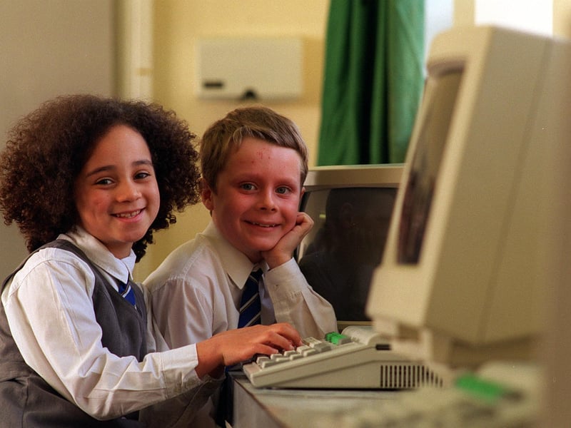 Pupils Luka Blackman-Gibbs and Daniel Cottrell try out the new computers at the opening of the new computer network system at Fir Tree Primary School in March 1997.