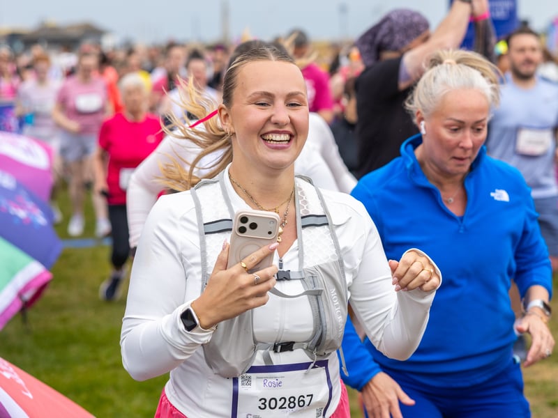 A 10k runner crosses the start line