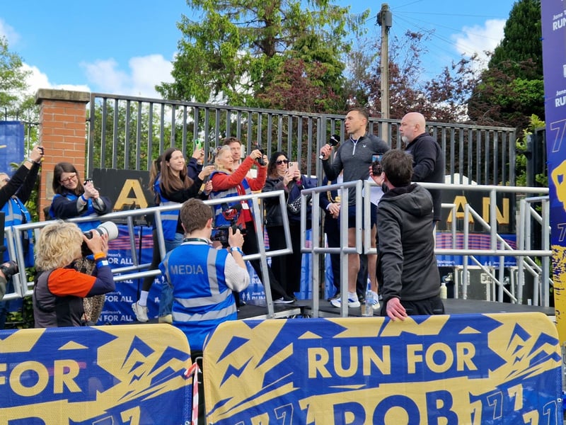 Leeds Rhinos legend Kevin Sinfield rallied the runners as they prepared to set off - paying tribute to Rob Burrow and his dad Geoff, who died earlier this year 