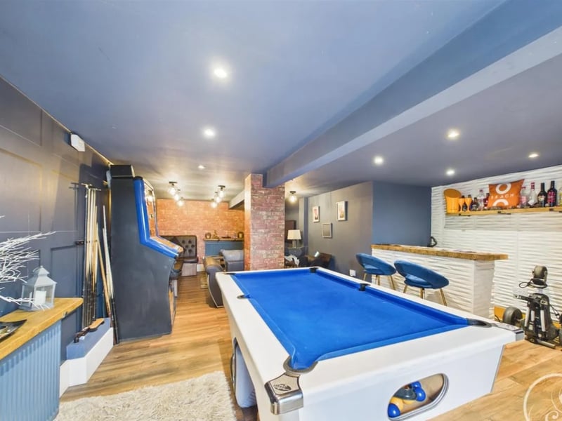 This stunning three-bedroom terraced house is beautifully presented throughout and boasts a low-maintenance garden and a basement/games room (pictured) with WC. It's situated in a sought-after area, with local amenities including shops, schools and transport links close by.