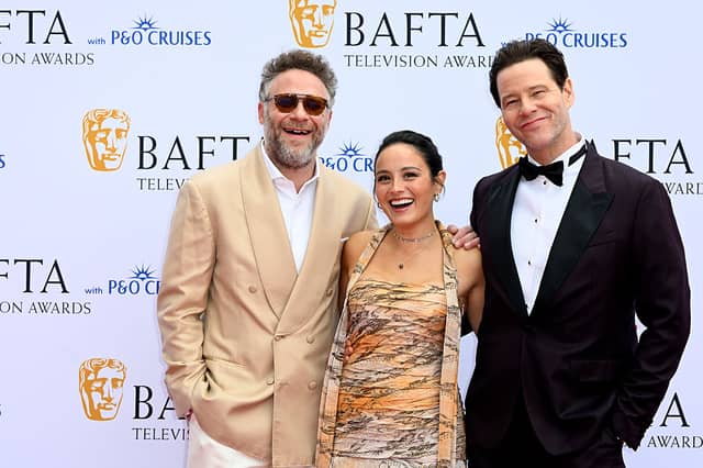 Seth Rogen, Chase Sui Wonders and Ike Barinholtz arrive at the Baftas.