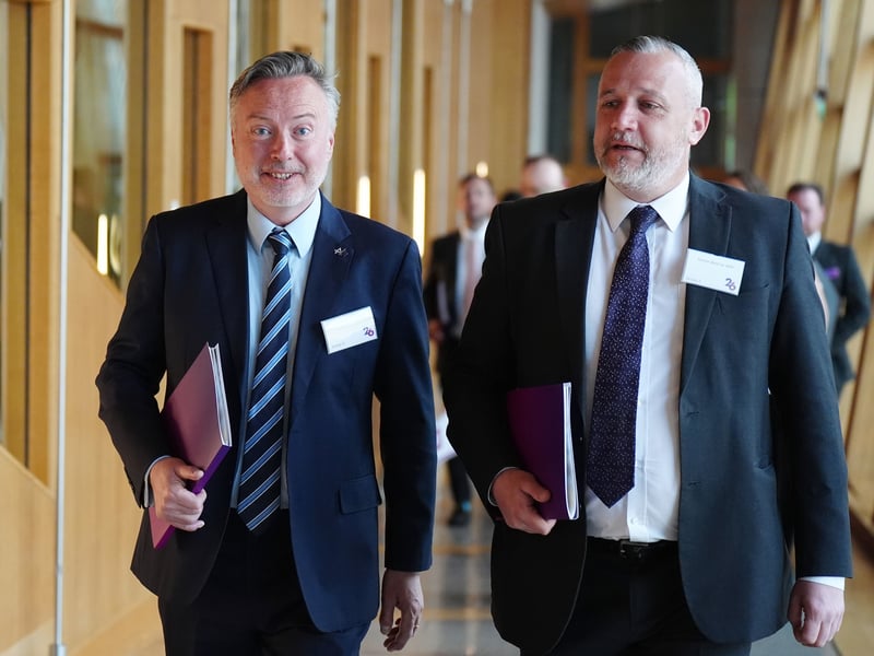 MSPs Alyn Smith and Steven Bonnar arriving at the Scottish Parliament at the firt day back since the election.