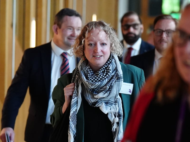 Scottish Green Party MSP Kate Nevens on her way to induction and registration.
